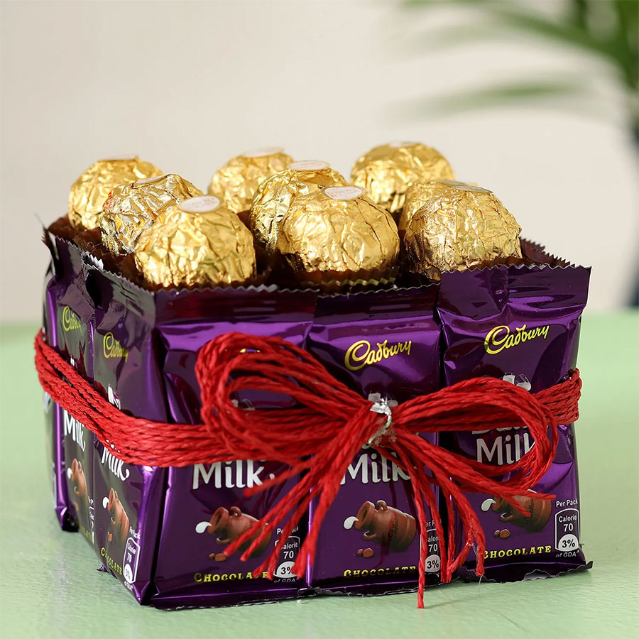Heart shaped KitKat chocolate gift hamper with skittles, galaxy & chocolates  -